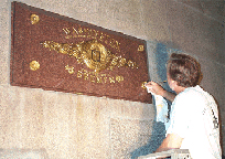 Michael Kramer toning the gilded medallions on the Bremen stone.